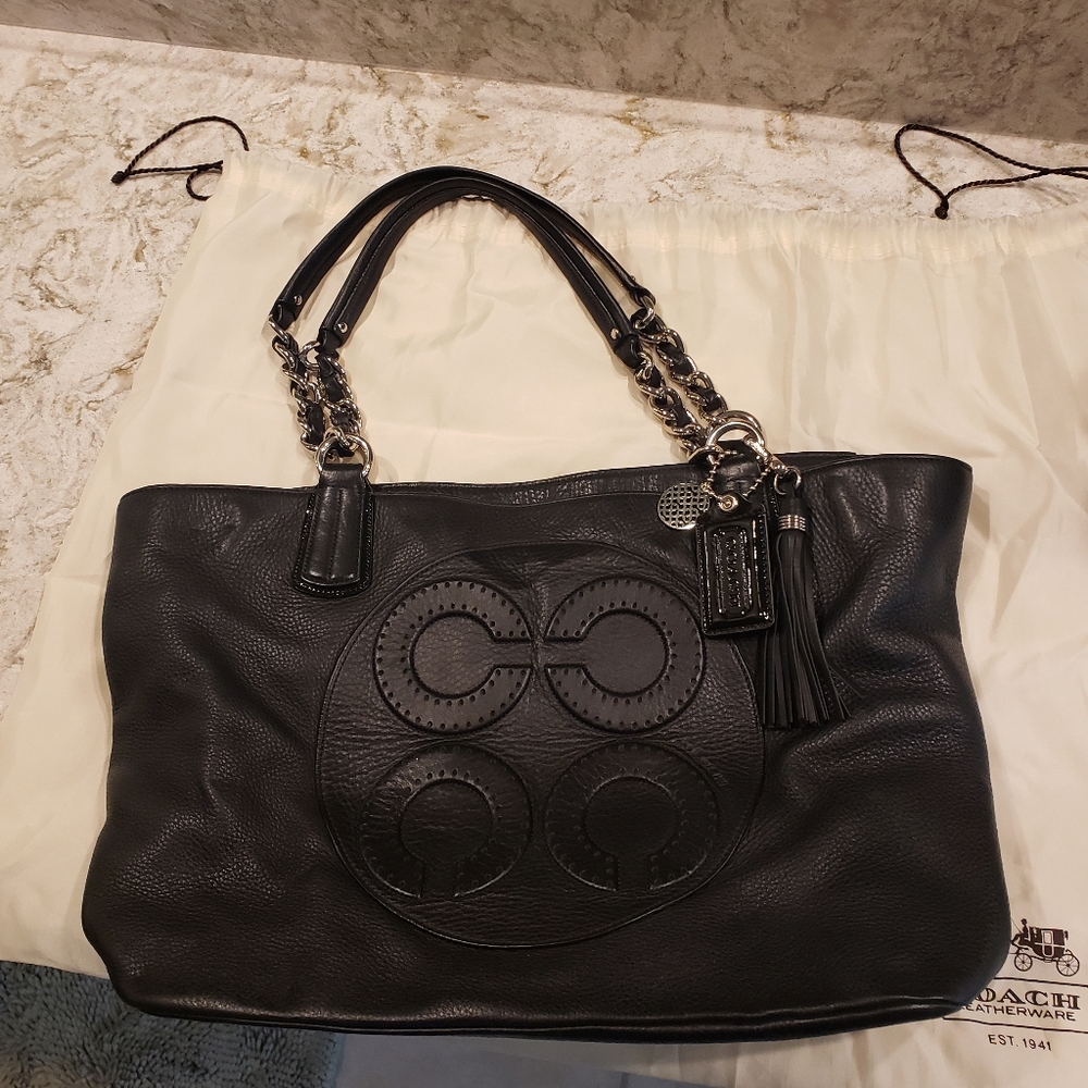 Coach black leather tote w/ dust bag and charms